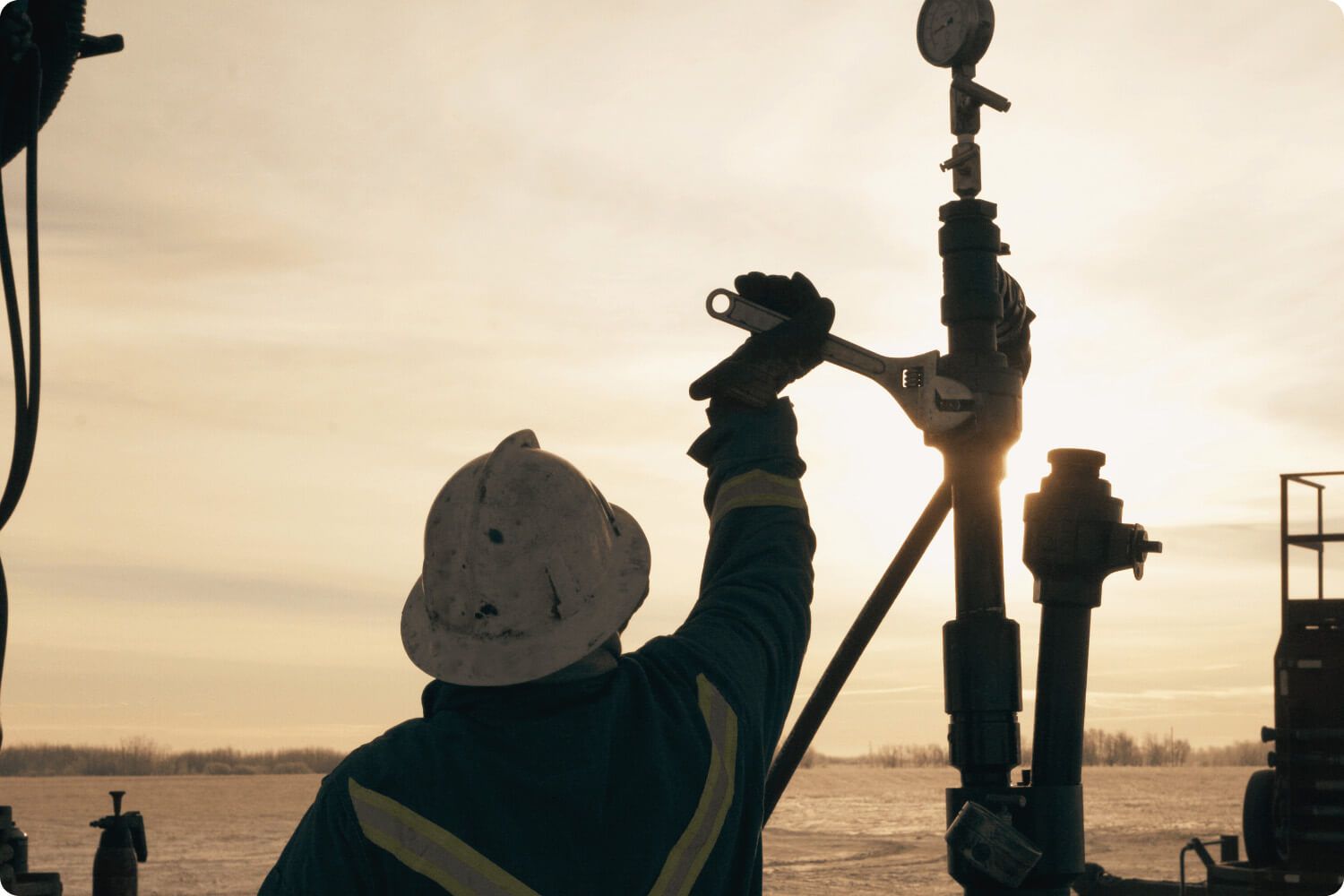 Worker turning wrench